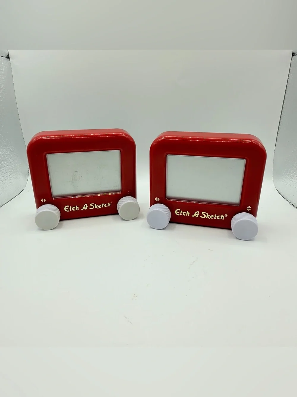 Pair of Mini Classic Red etch a Sketch toys